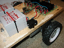 closeup side view of batteries, cut off switch and diverse electronics 24v speed controllers